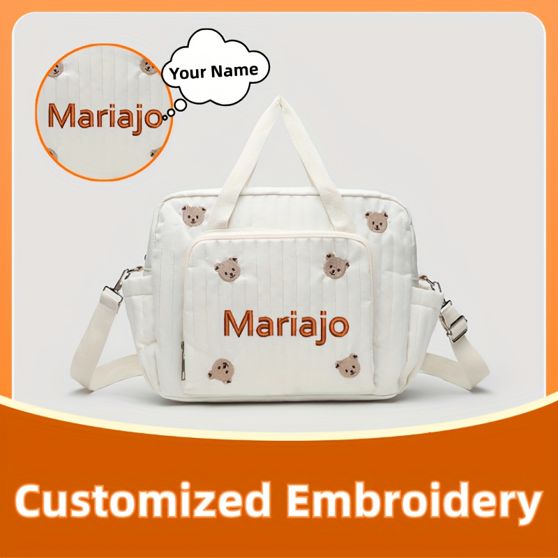 Embroidery Fonts - กระเป๋าเดินทางลายหมีและดอกทิวลิป 1 ใบ พร้อมบริการปักชื่อตามสั่ง (สำหรับการสั่งทำพิเศษ กรุณาระบุแบบตัวอักษรและข้อความ)